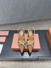 MIUMIU 26S SLINGBACK 55MM IN CARAMEL BROWN CALFSKIN WITH BOW