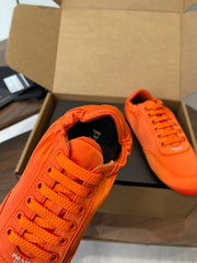 PRADA 25S SNEAKER IN ORANGE SILK