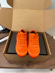 PRADA 25S SNEAKER IN ORANGE SILK