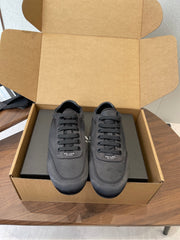 PRADA 25S SNEAKER IN BLACK SILK