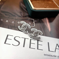 DOUBLE C STUD EARRINGS WITH WHITE TRIM AND CLEAR STONE LOGO