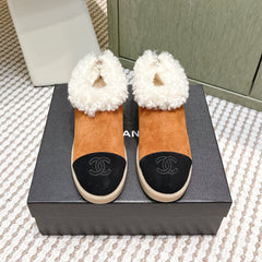 CHANEL 25S SHORT SUEDE BOOTS IN CARAMEL AND BLACK WITH SHEEPSKIN LINING