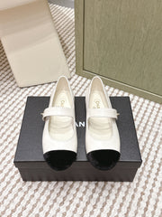 CHANEL 25S MARY JANE FLAT IN WHITE LAMBSKIN WITH BLACK VELVET CAP TOE