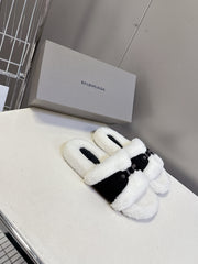 BALENCIAGA 25S SLIPPERS IN BLACK SUEDE AND WHITE WOOL