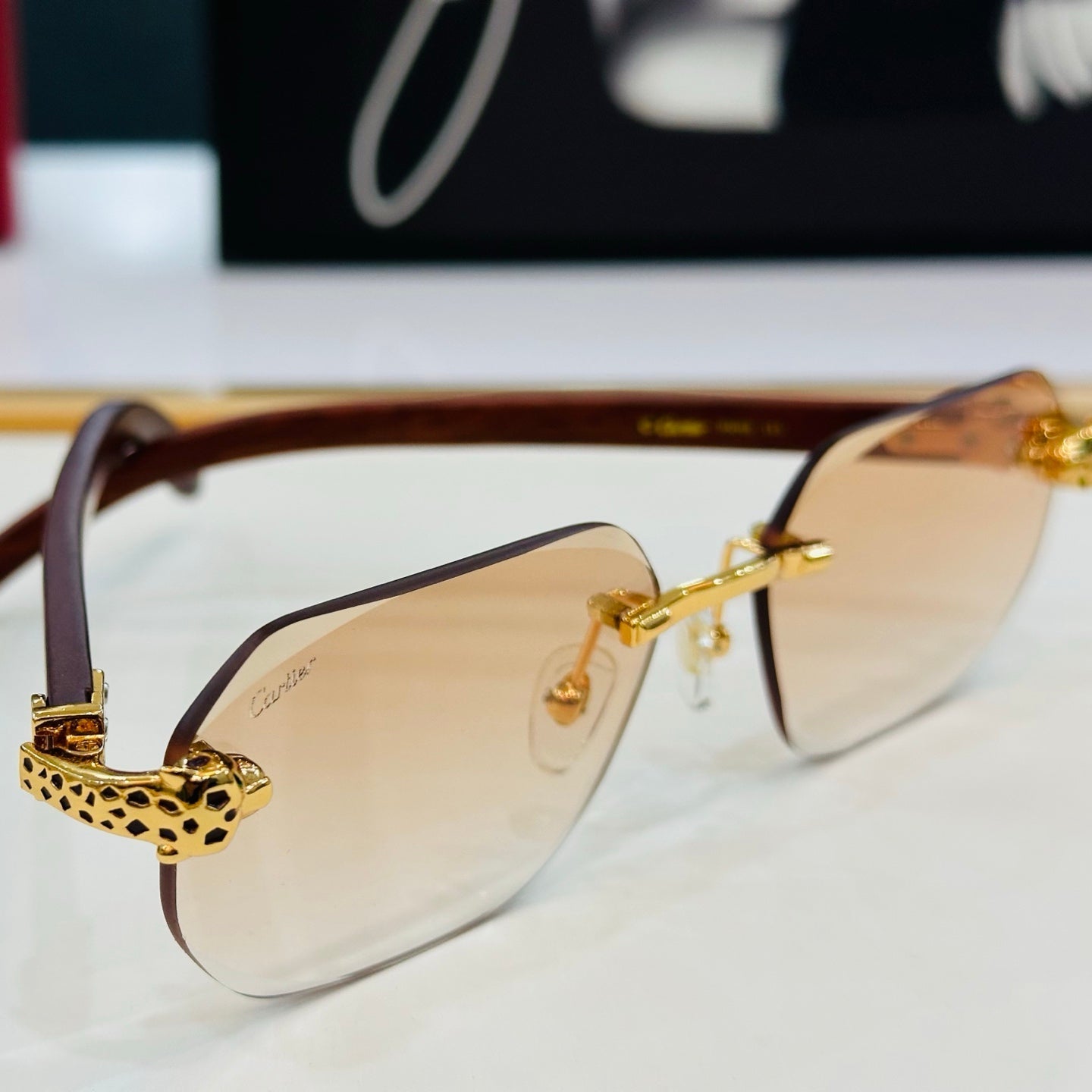 PANTHÈRE RIMLESS OVAL FRAME SUNGLASSES  543637 IN METAL