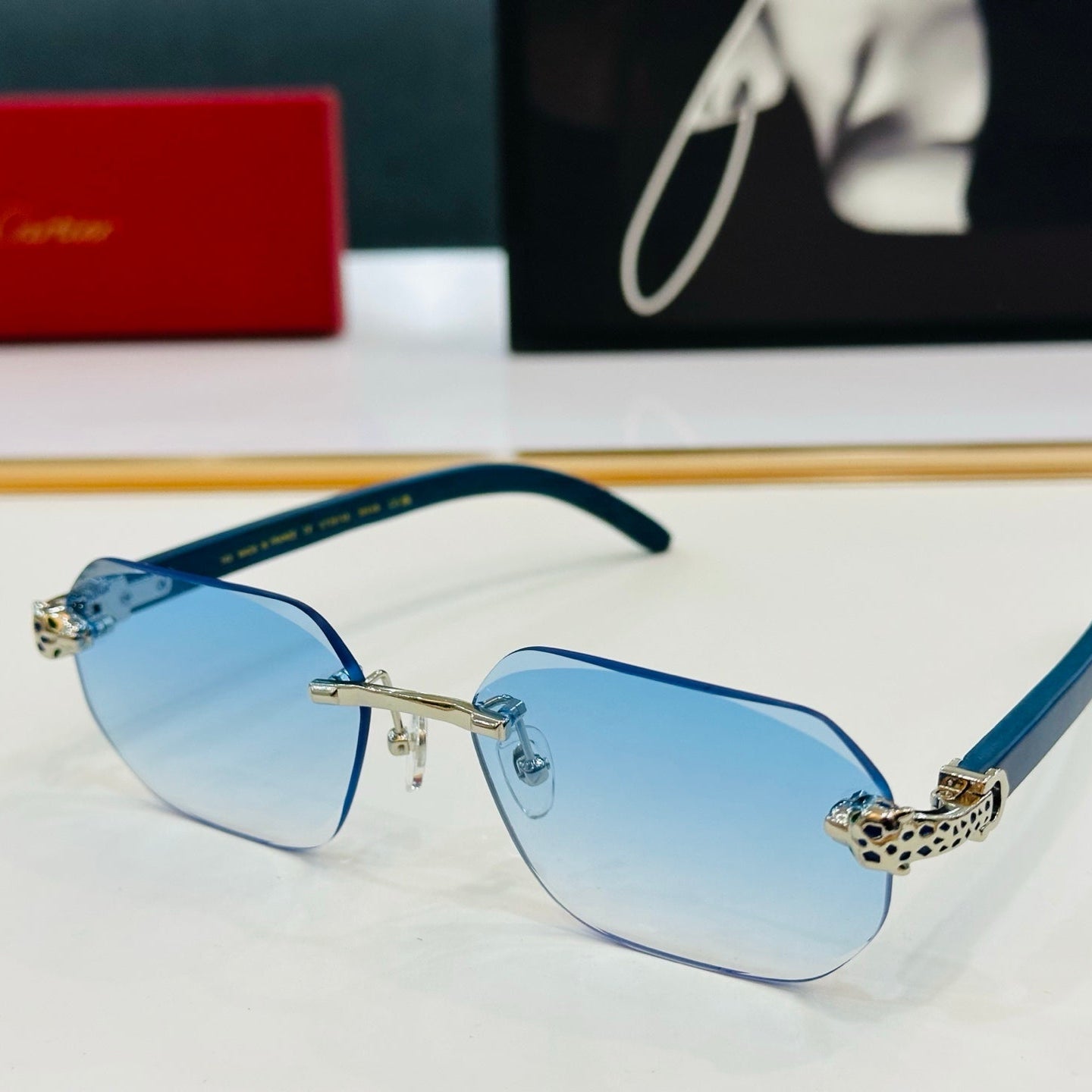 PANTHÈRE RIMLESS OVAL FRAME SUNGLASSES  543637 IN METAL