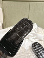 FLAT MULES IN BLACK CROCODILE EMBOSSED GLOSSY CALFSKIN