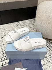 PRADA 25S RUBBER SLIDE IN WHITE CALFSKIN WITH LOGO