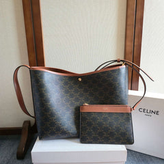 CELINE 25S SOFT SHOPPER BAG 32 IN BLACK TRIOMPHE CANVAS AND BROWN CALFSKIN