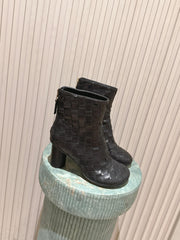 BOTTEGA VENETA 26S INTRECCIATO BOOTS 85 MM IN BLACK LAMBSKIN