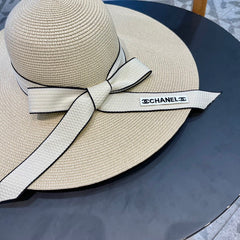 WIDE BRIM STRAW HAT WITH BOW BEIGE 672706