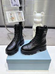 PRADA 25S WARRIOR BOOTS IN BLACK CALFSKIN