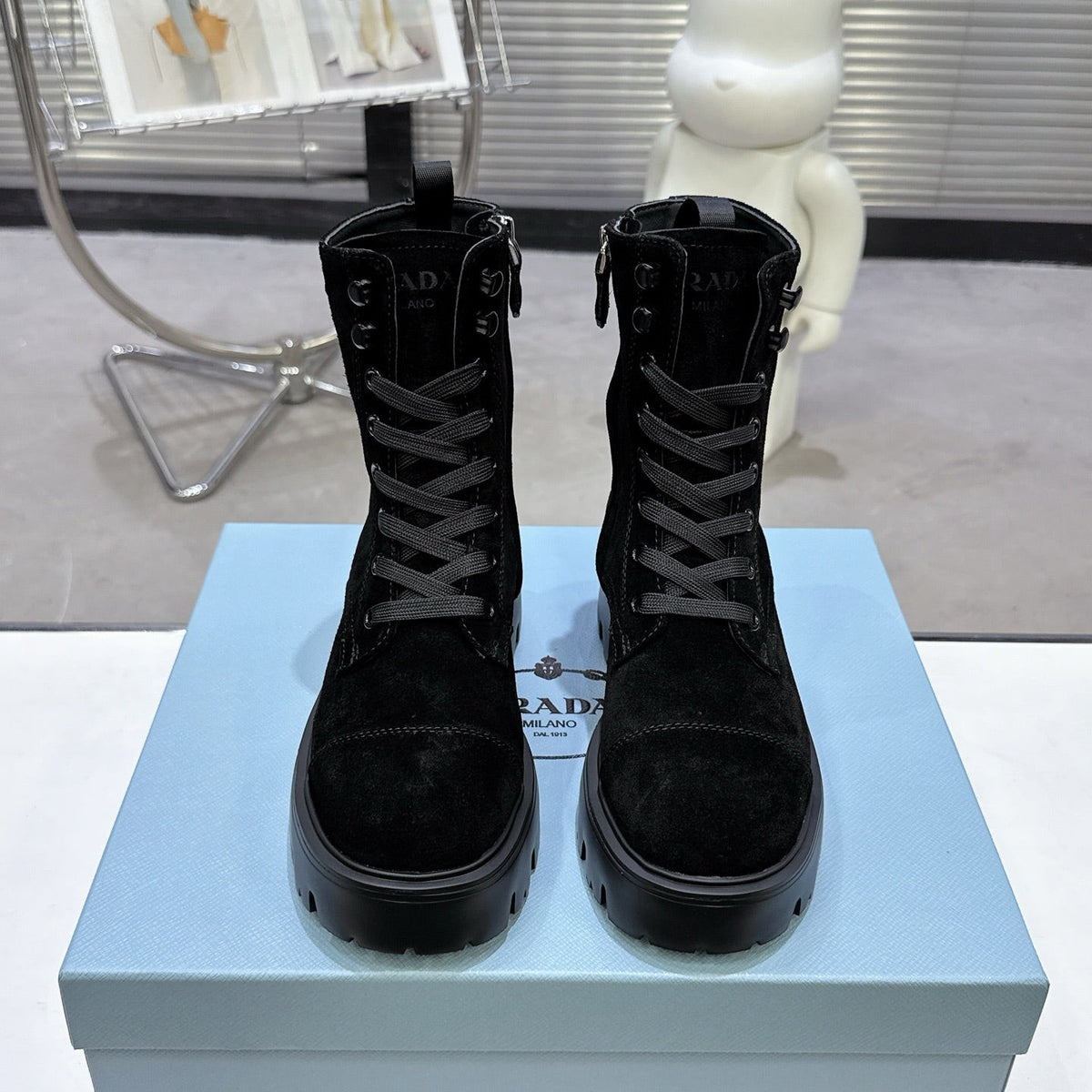PRADA 25S WARRIOR BOOTS IN BLACK SUEDE
