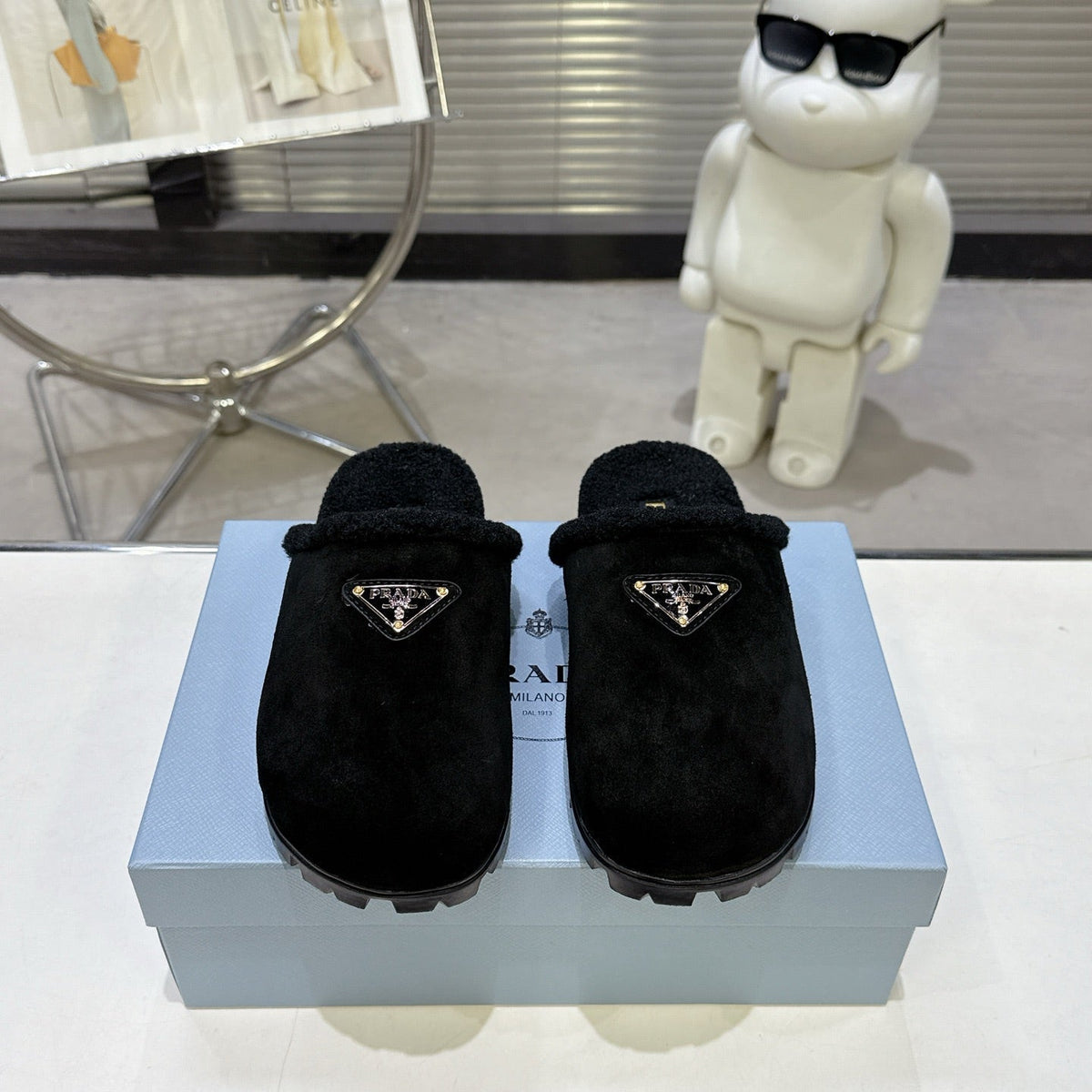 PRADA 25S FUR-LINED SABOT MULES IN BLACK SUEDE