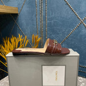 FLAT MULE IN SYRUP BROWN CALFSKIN