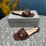 FLAT MULE IN SYRUP BROWN CALFSKIN