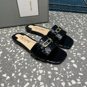 FLAT MULE IN BLACK CALFSKIN