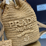 BUCKET BAG 20 IN BEIGE WOVEN RAFFIA EMBOSSED LOGO