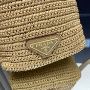 BUCKET BAG 20 IN BEIGE WOVEN RAFFIA EMBOSSED LOGO