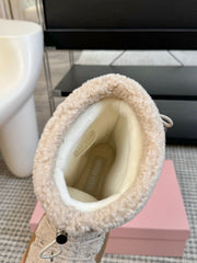 SNOW ANKLE BOOTS IN COSMIC LATTE SHEARLING