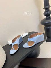 ALAIA WEDGE THONG SANDALS 25S IN BLUE SATIN