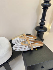 ALAIA FLAT MULES 25S IN WHITE MIX BROWN WOVEN MESH
