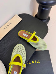 ALAIA FLAT MULES 25S IN MINT GREEN WOVEN MESH