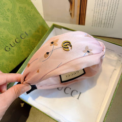 HAIRBAND WITH FLOWER PRINT IN BABY PINK SILK 398863