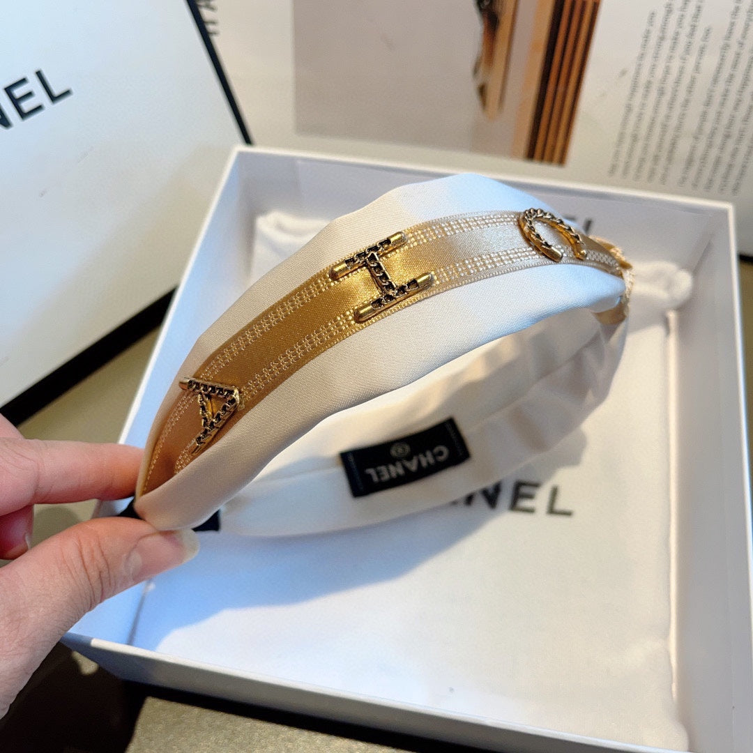WHITE SILK HAIRBAND WITH GOLD LOGO 412440