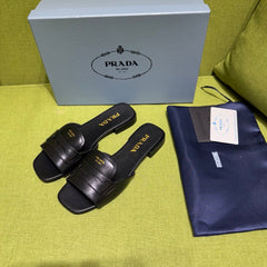 PRADA 25S SLIDES IN BLACK CALFSKIN