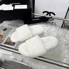 CHANEL 25S FUR SLIPPERS IN WHITE