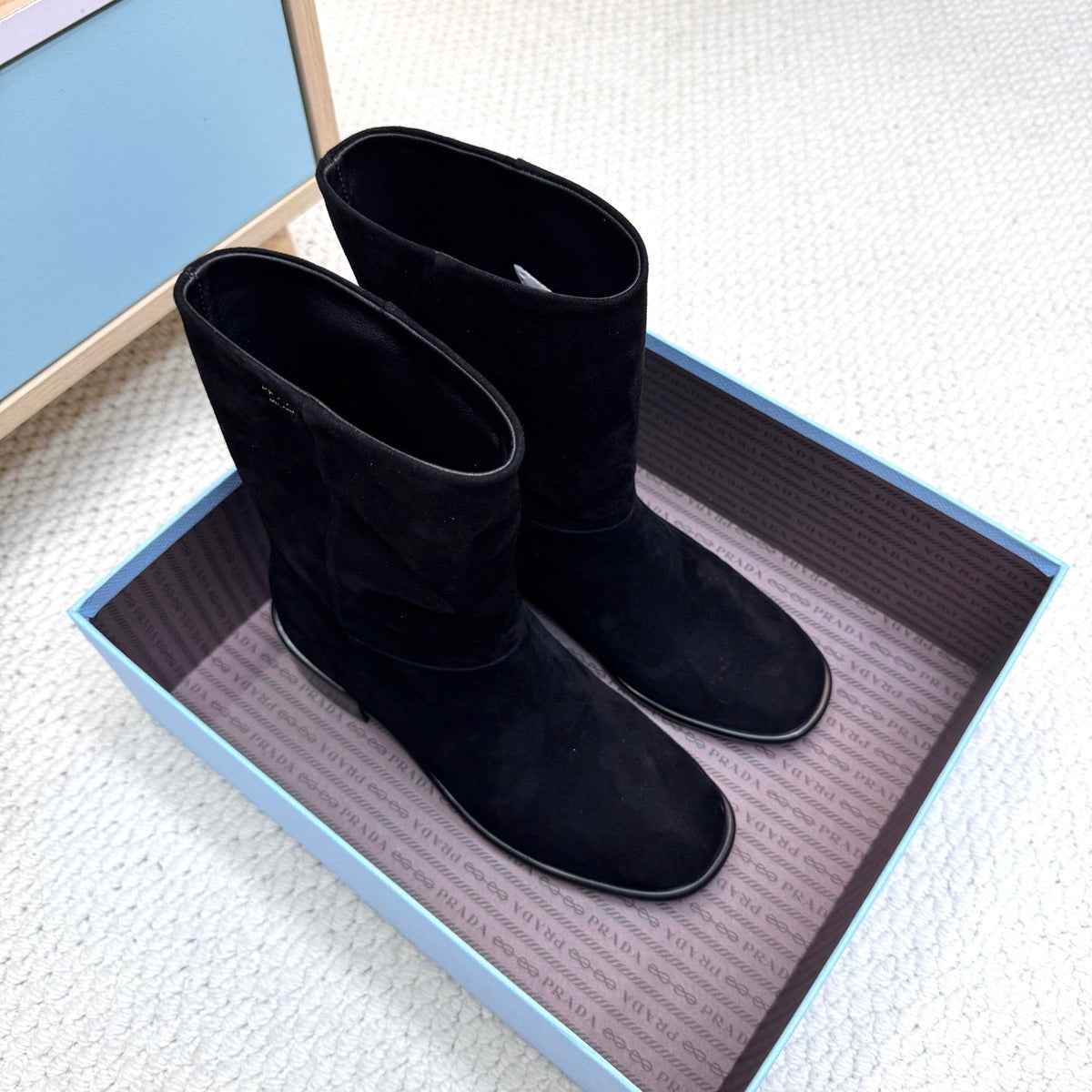 PRADA 25S LOW-CUT BOOTS IN BLACK SUEDE