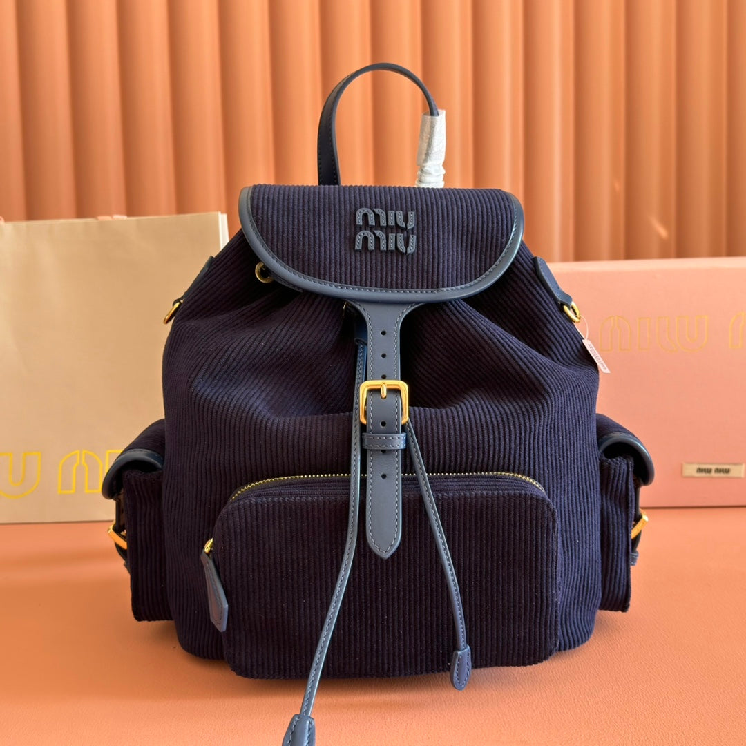 MIUMIU 26S MEDIUM BACKPACK 29 IN DARK BLUE CANVAS BLUE CALFSKIN