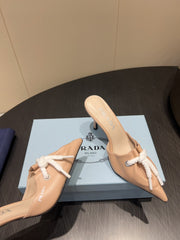 PRADA 25S BRAIDED DETAIL MULES 85MM IN BEIGE CALFSKIN