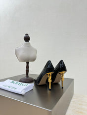 KNOT HIGH PUMP IN BLACK CALFSKIN WITH WOVEN DESIGN AND GOLD METAL HEEL 9 CM