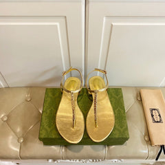 GG SIGNORINA THONG SANDALS IN GOLD SHEEPSKIN