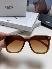 TRIOMPHE SUNGLASSES 552774 IN CARAMEL ACETATE TEXT LOGO