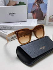 TRIOMPHE SUNGLASSES 552774 IN CARAMEL ACETATE TEXT LOGO