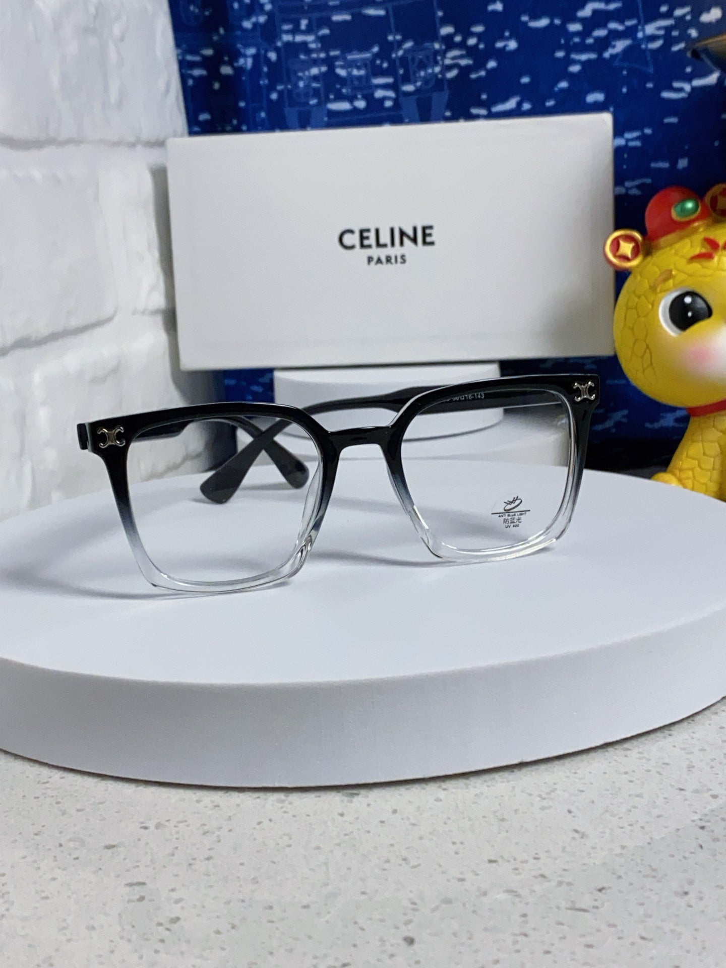 TRIOMPHE SUNGLASSES 563255 IN BLACK TO CLEAR ACETATE