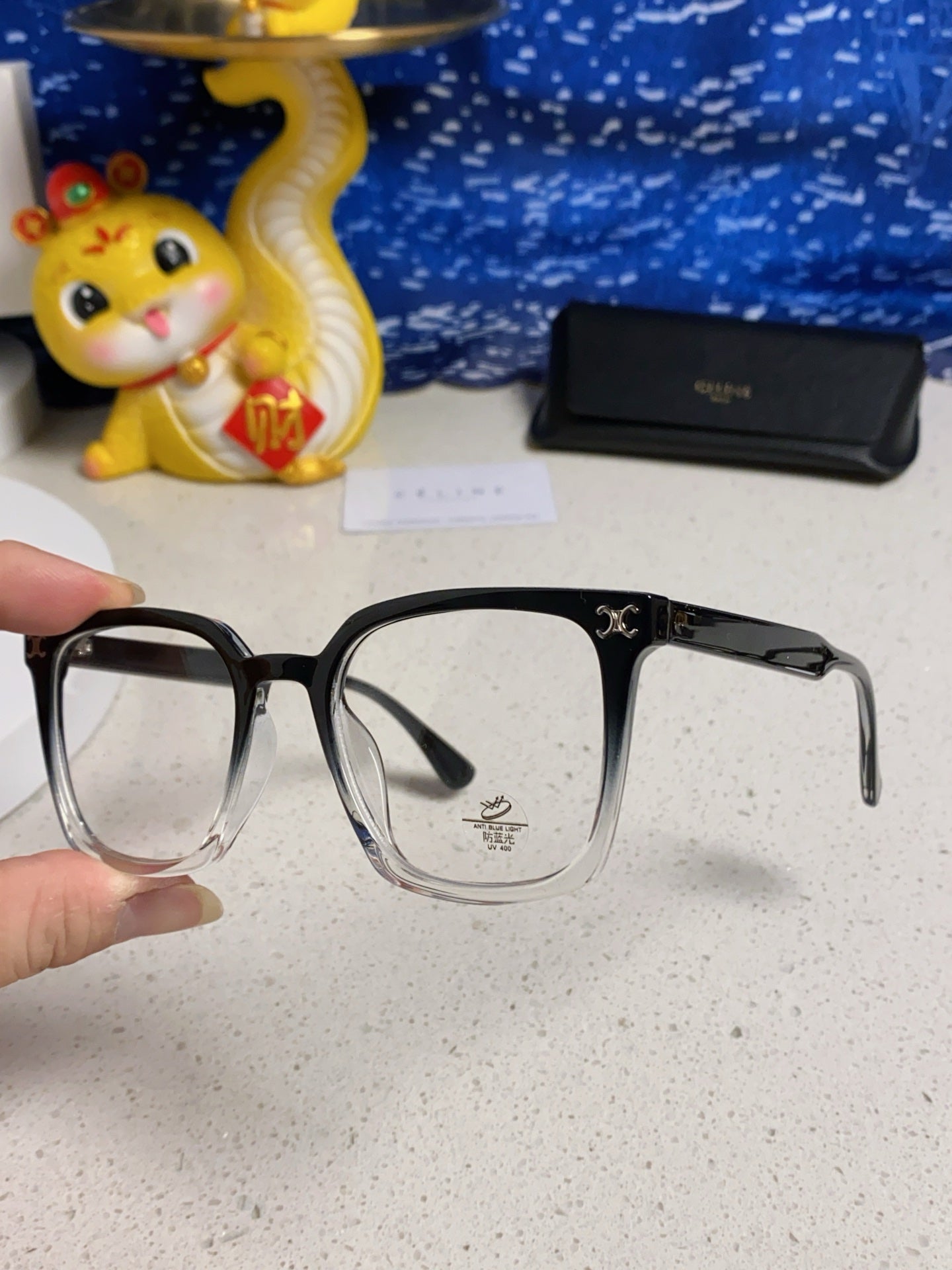 TRIOMPHE SUNGLASSES 563255 IN BLACK TO CLEAR ACETATE