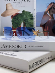 BUTTERFLY EMBELLISHED RIMLESS RECTANGULAR FRAME SUNGLASSES 570245 IN METAL