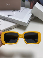 MONTAIGNE SUNGLASS 571593 IN YELLOW ACETATE TEXT LOGO