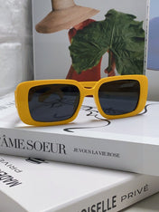 MONTAIGNE SUNGLASS 571593 IN YELLOW ACETATE TEXT LOGO