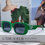 MONTAIGNE SUNGLASS 571594 IN GREEN ACETATE TEXT LOGO