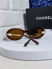 OVAL SUNGLASSES 640342 IN BROWN CLEAR ACETATE METAL FRAME