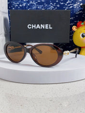 OVAL SUNGLASSES 640342 IN BROWN CLEAR ACETATE METAL FRAME