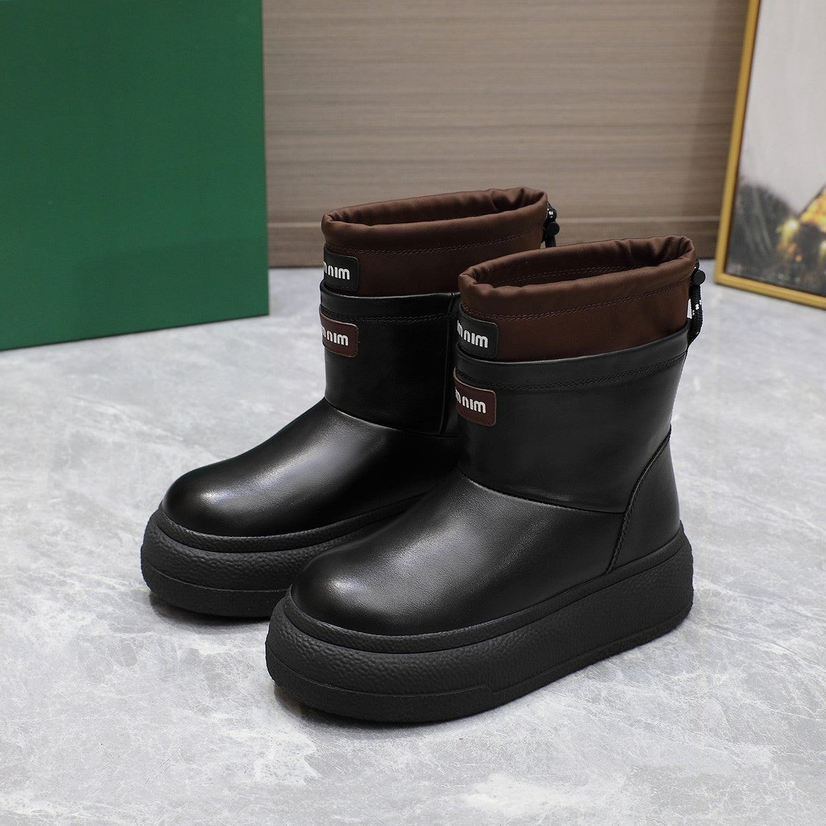 THICK-SOLED SNOW BOOTS IN BLACK CALFSKIN MIX CHOCOLATE NYLON