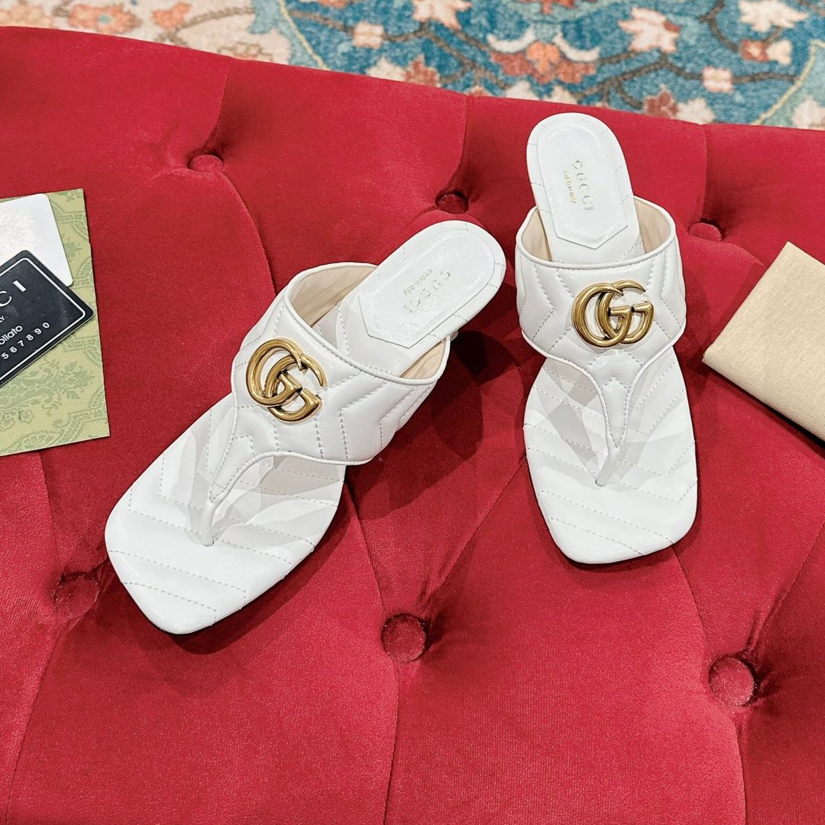 HIGH THONG MULE 55MM IN WHITE CALFSKIN WITH GOLD HARDWARE