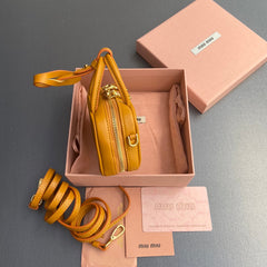 MICRO BAG KEYCHAIN 11  IN INDOCHINE ORANGE CALFSKIN EMBOSSED LOGO