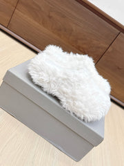BALENCIAGA 25S MULES IN WHITE FAUX FUR